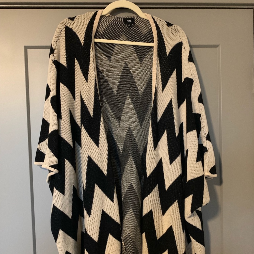 Boho poncho sweater with fringe
